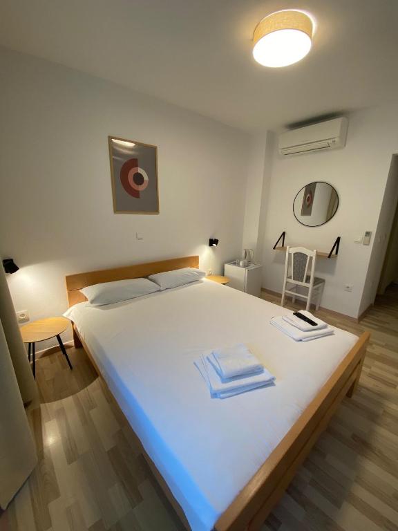Posteľ alebo postele v izbe v ubytovaní Apart-pansion Promajna