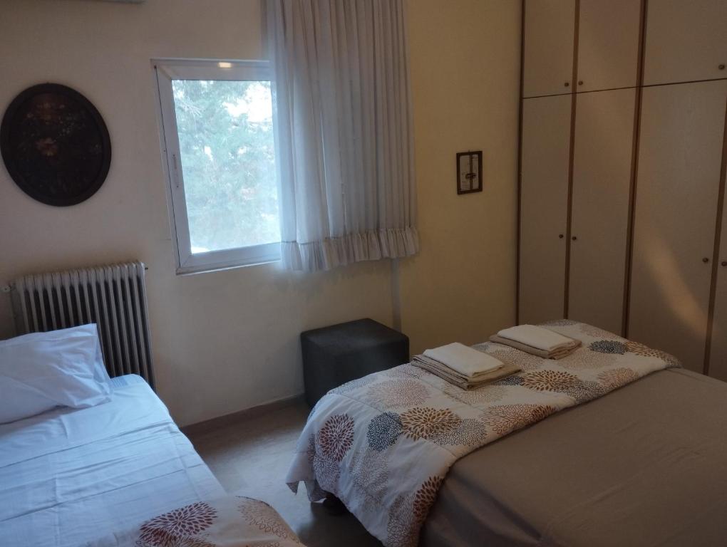 Posteľ alebo postele v izbe v ubytovaní Seaview to Olympus, sunny, cosy apartment
