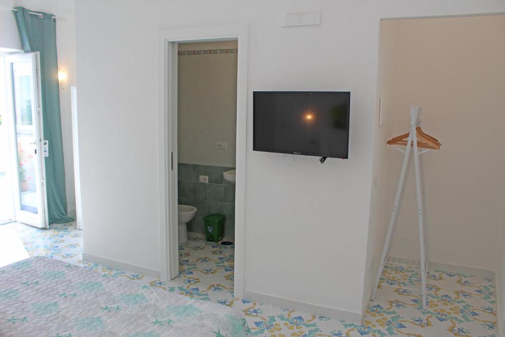 TV a/nebo společenská místnost v ubytování B&B Casa Angelina