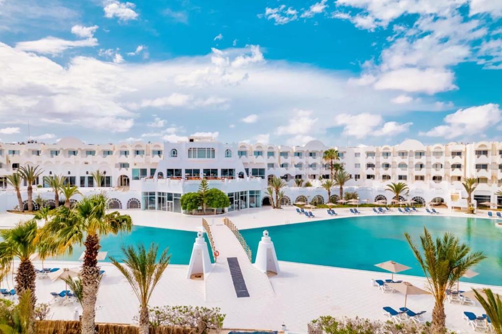 a view of the resort from the pool at Best Time Alkantara Djerba in Djerba