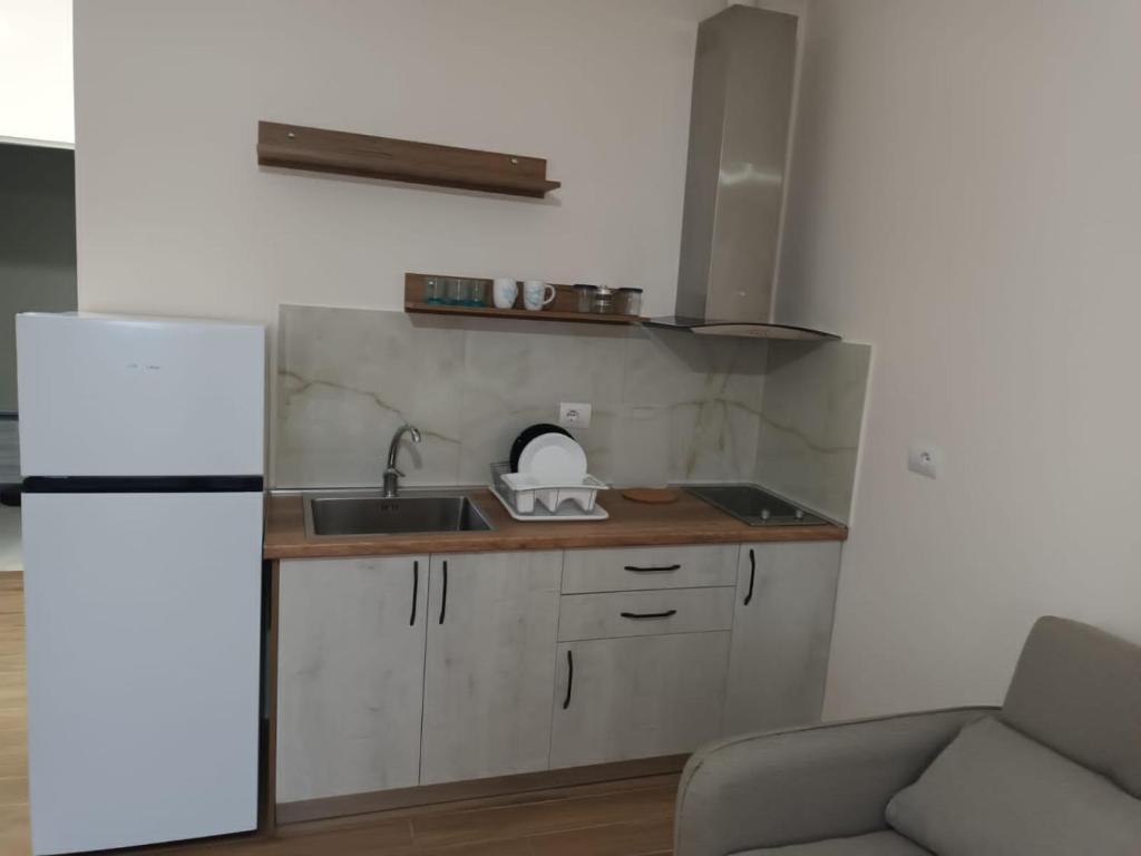 Η κουζίνα ή μικρή κουζίνα στο Devi's Apartment