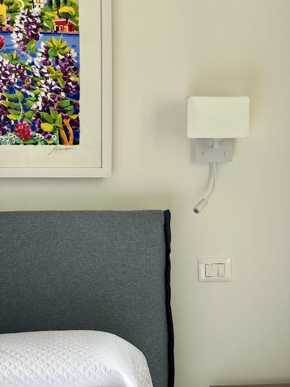 Postel nebo postele na pokoji v ubytování Ancora Suites