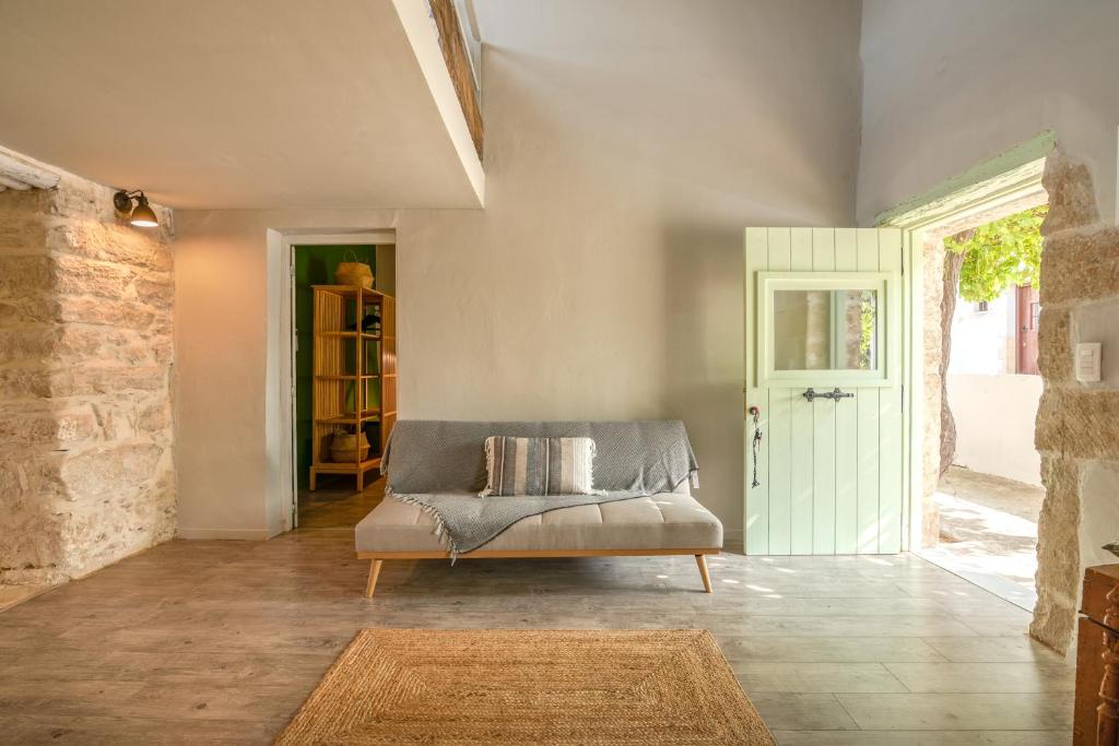 Postel nebo postele na pokoji v ubytování Mourelo Home