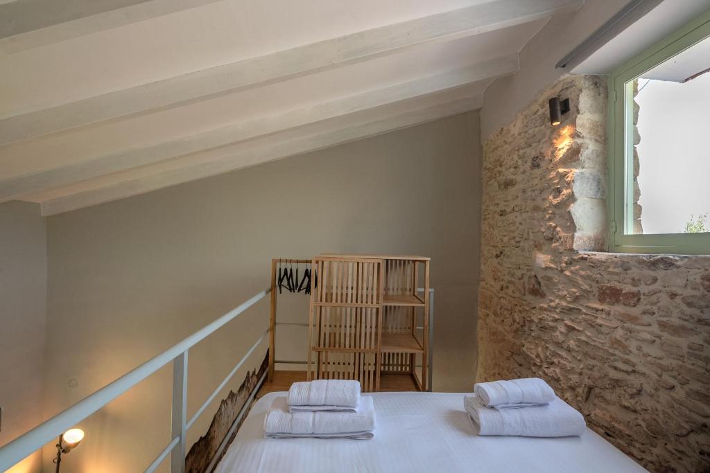 Postel nebo postele na pokoji v ubytování Mourelo Home