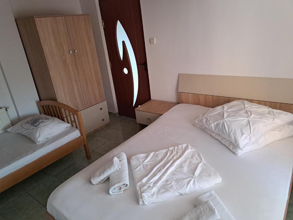 Postel nebo postele na pokoji v ubytování Lamy