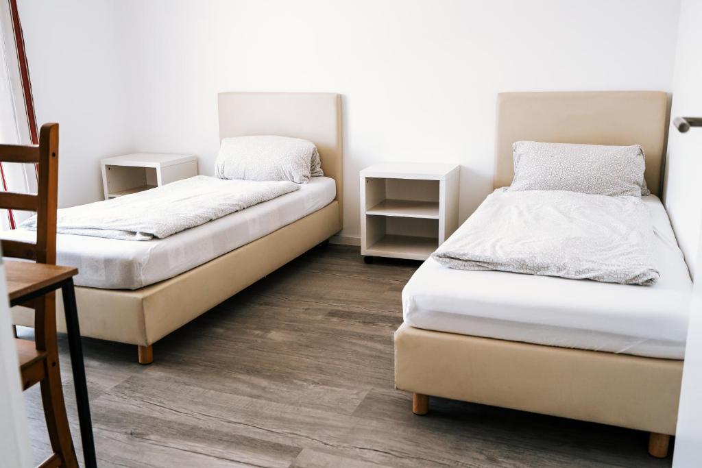 Ένα ή περισσότερα κρεβάτια σε δωμάτιο στο Dill Apartments Stederdorf