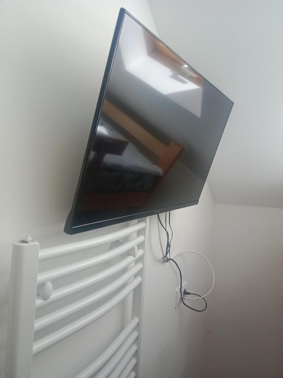 TV a/nebo společenská místnost v ubytování Vila Tutić Apartman 1 i Apartman 2