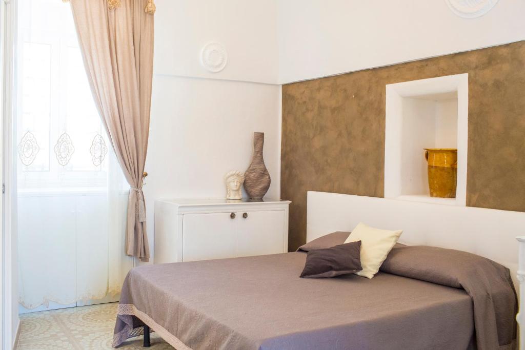 Säng eller sängar i ett rum på B&B Masseria Sant'Elia
