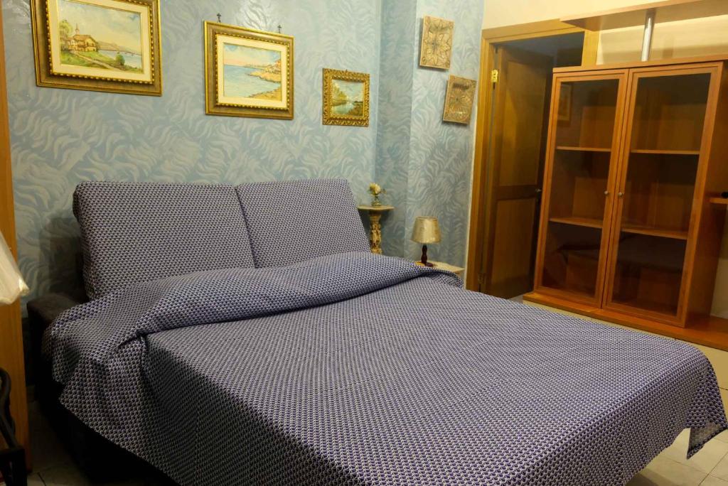 Postel nebo postele na pokoji v ubytování B&B TascaPachino