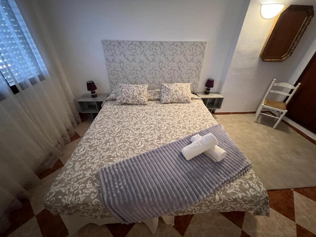 Postel nebo postele na pokoji v ubytování casa grande en Córdoba, pueblo de la Victoria , 6 dormitorios