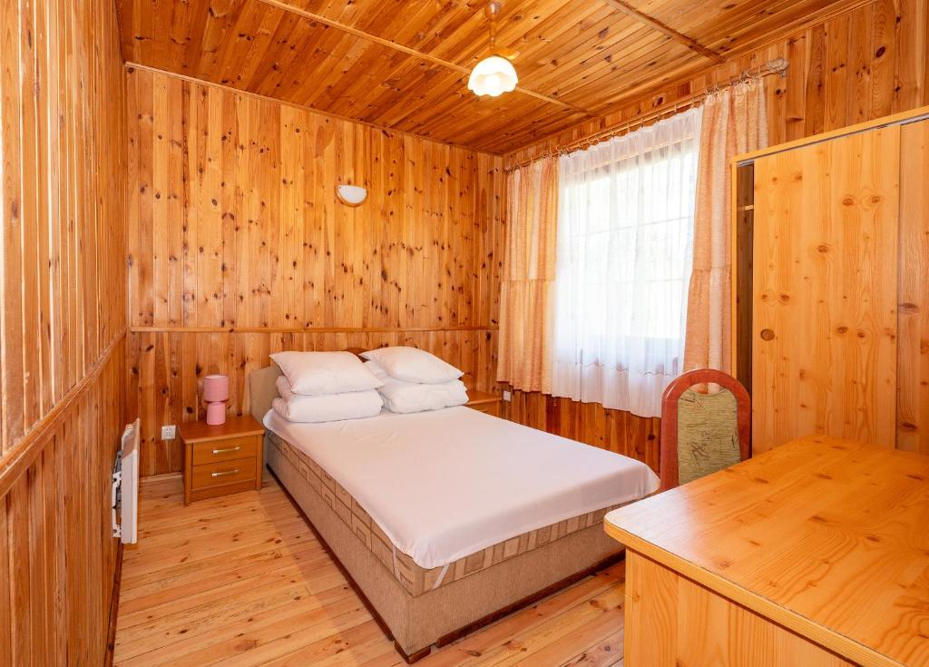Postel nebo postele na pokoji v ubytování Gościniec Jędruś