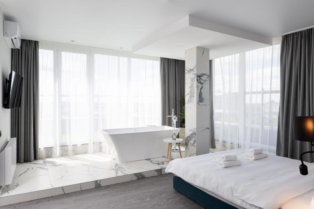 Postel nebo postele na pokoji v ubytování Be The One Hotel