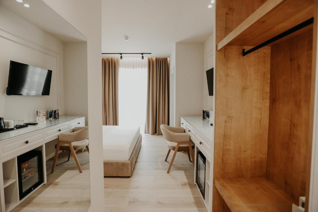 TV a/nebo společenská místnost v ubytování Seaside Hotel