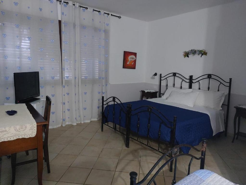 Postel nebo postele na pokoji v ubytování Azzurro mare