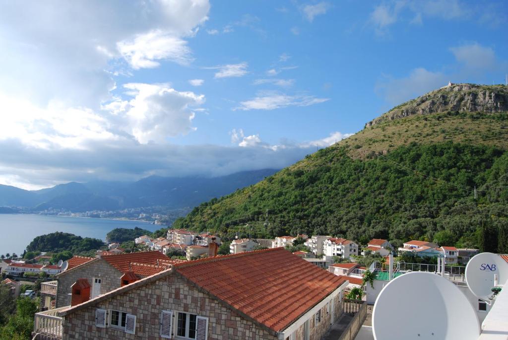 a view of a town with a mountain at Villa Nikola Kentera in Sveti Stefan