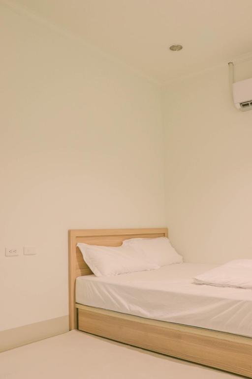 Postel nebo postele na pokoji v ubytování TETE Homestay