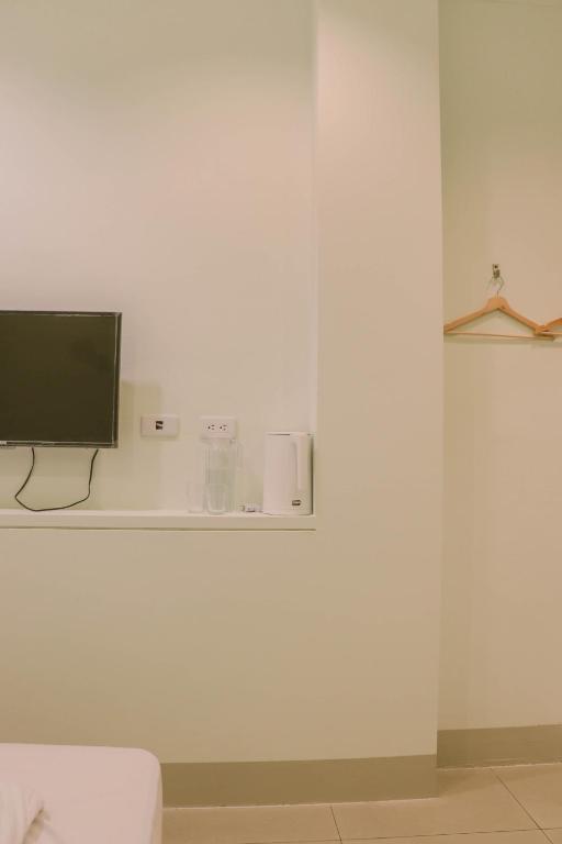 TV a/nebo společenská místnost v ubytování TETE Homestay