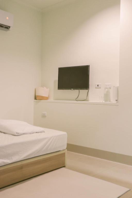 Postel nebo postele na pokoji v ubytování TETE Homestay