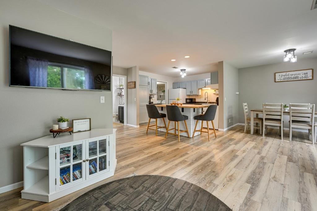 a living room and kitchen with a table and chairs at Dog-Friendly Baraboo Vacation Rental with Yard! in Baraboo