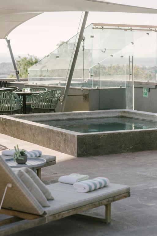 Bazén v ubytování Hotel Apapacho Boutique nebo v jeho okolí