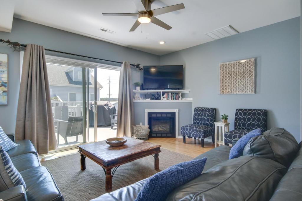 A seating area at Idyllic Ocean Block Bethany Beach Retreat with Views