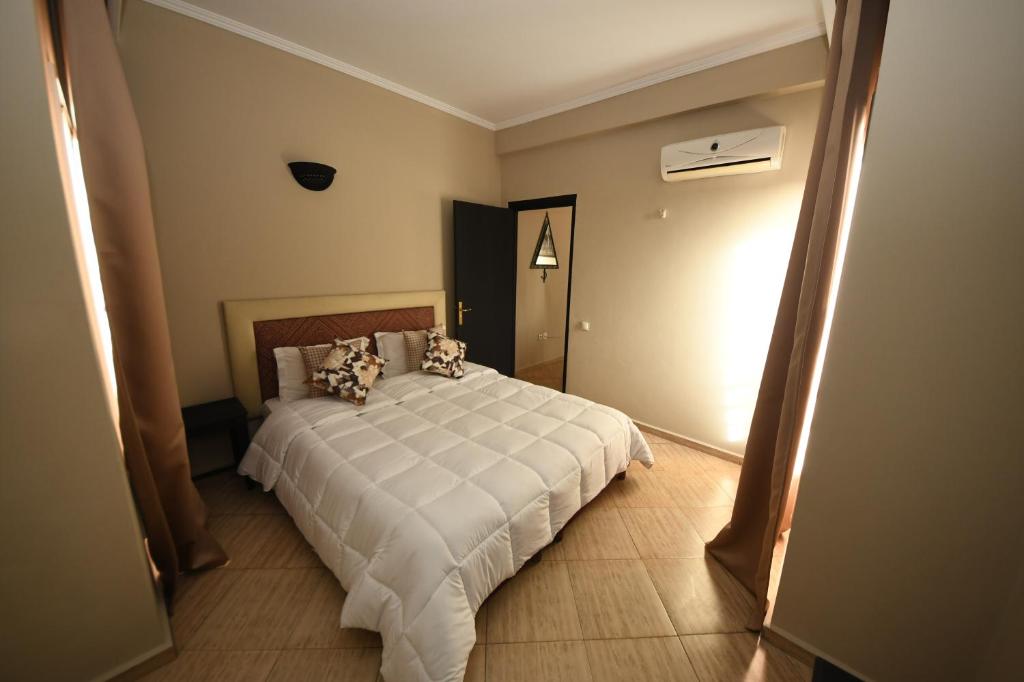 Postel nebo postele na pokoji v ubytování Agyad Maroc Appart-Hotel