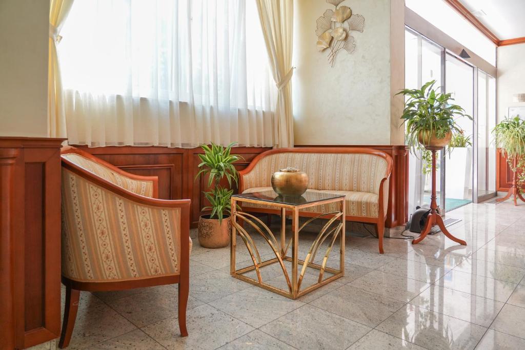 A seating area at Hotel Villa Bacchus
