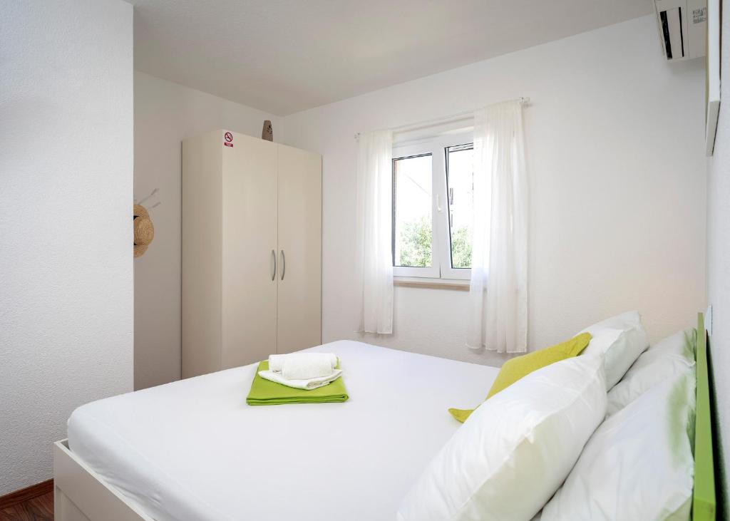 Postel nebo postele na pokoji v ubytování Guest House Milan
