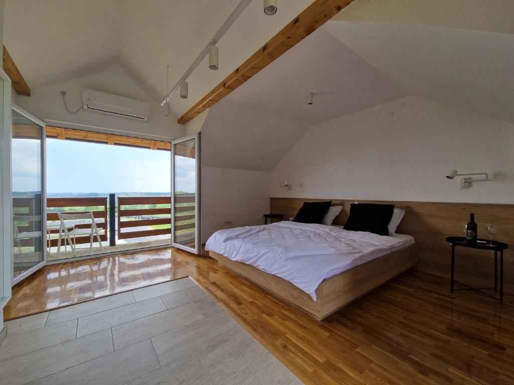 Postel nebo postele na pokoji v ubytování Apartmani Vinarije IN