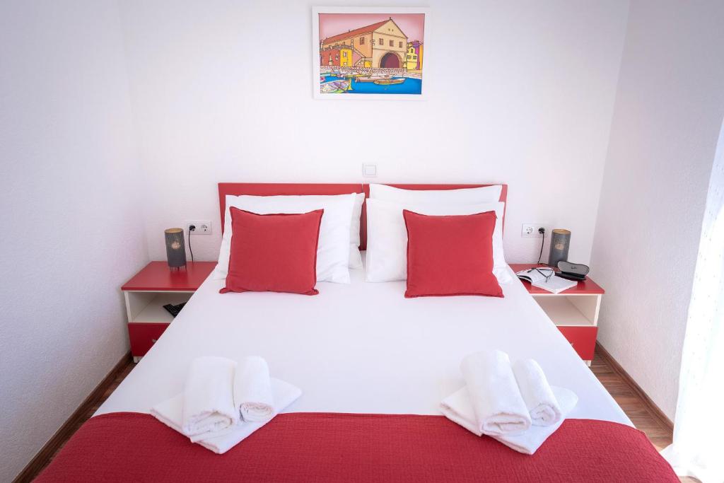 Postel nebo postele na pokoji v ubytování Guest House Milan