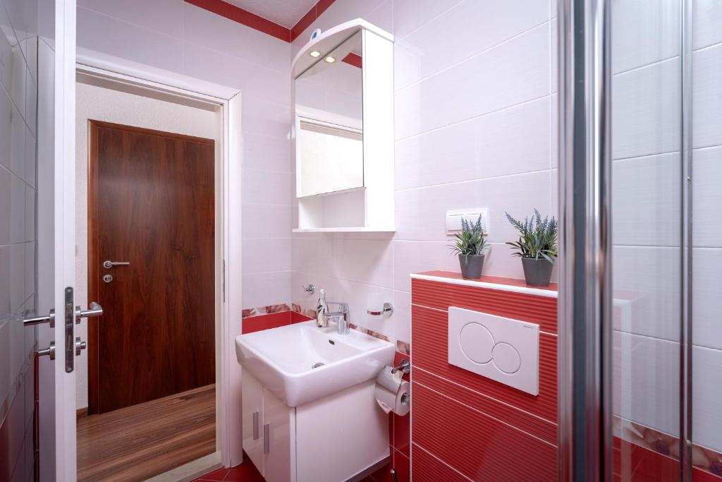 Koupelna v ubytování Guest House Milan