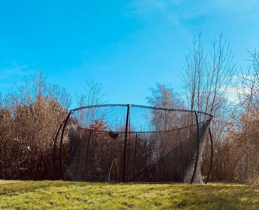 a large net in the middle of a field at Cosy place with adoring sunny terrace in Vejby