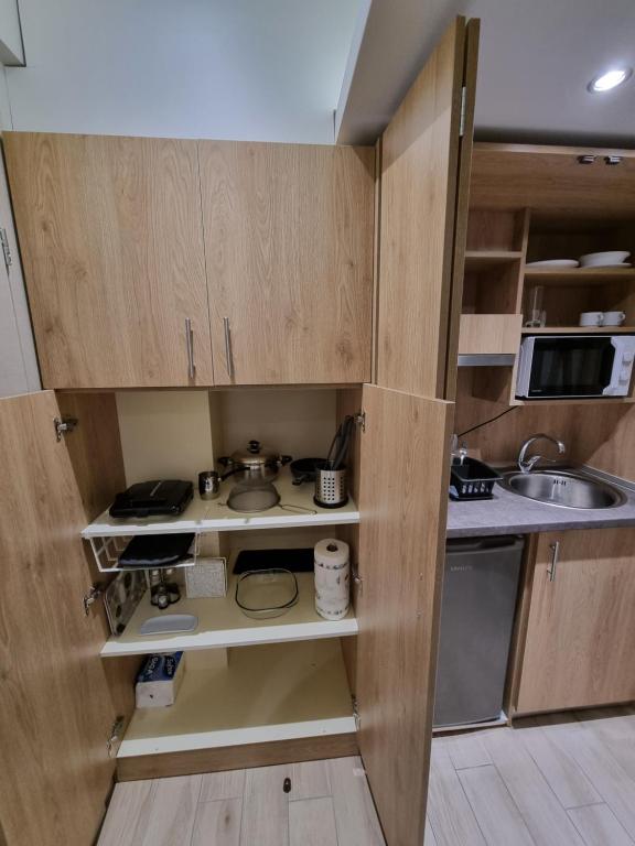 Kuchyň nebo kuchyňský kout v ubytování Xanthi Studio Apartments
