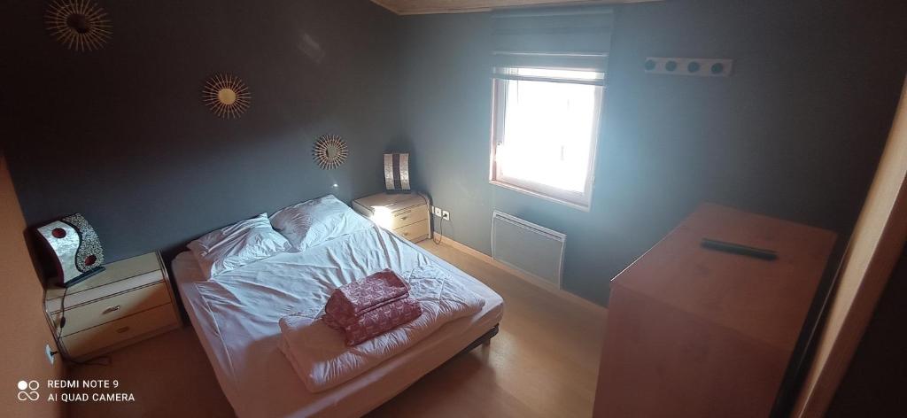 Posteľ alebo postele v izbe v ubytovaní Gite Glaïeul
