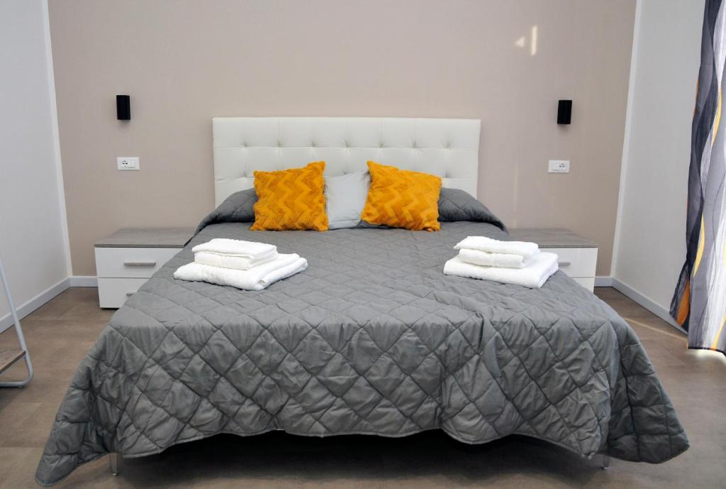 Postel nebo postele na pokoji v ubytování Kamome Rooms