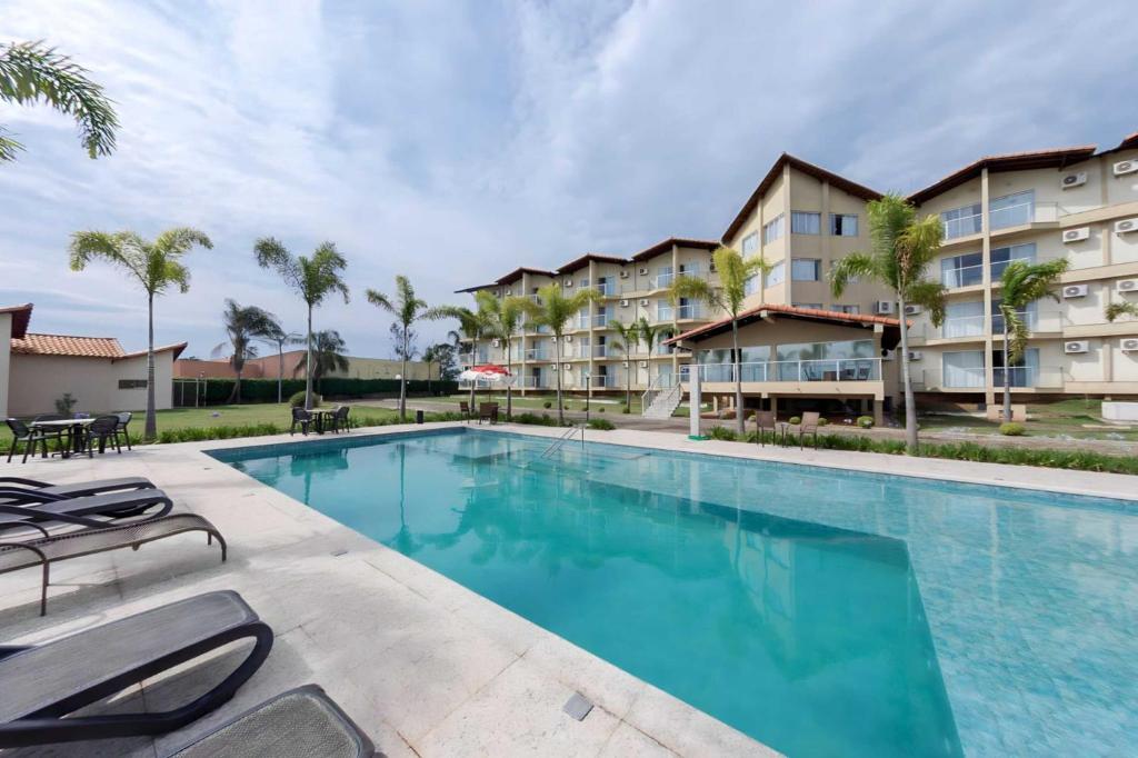 Bazén v ubytování Class Hotel Passos Rio Grande Portal da Canastra nebo v jeho okolí