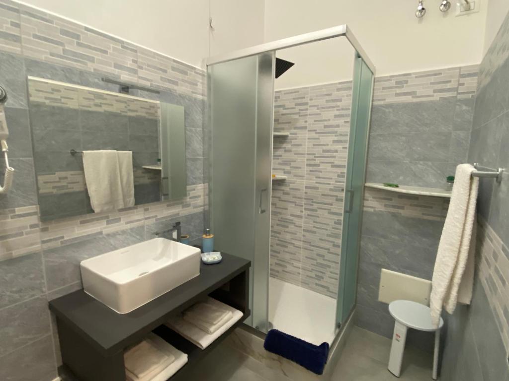 Koupelna v ubytování Titi Rooms