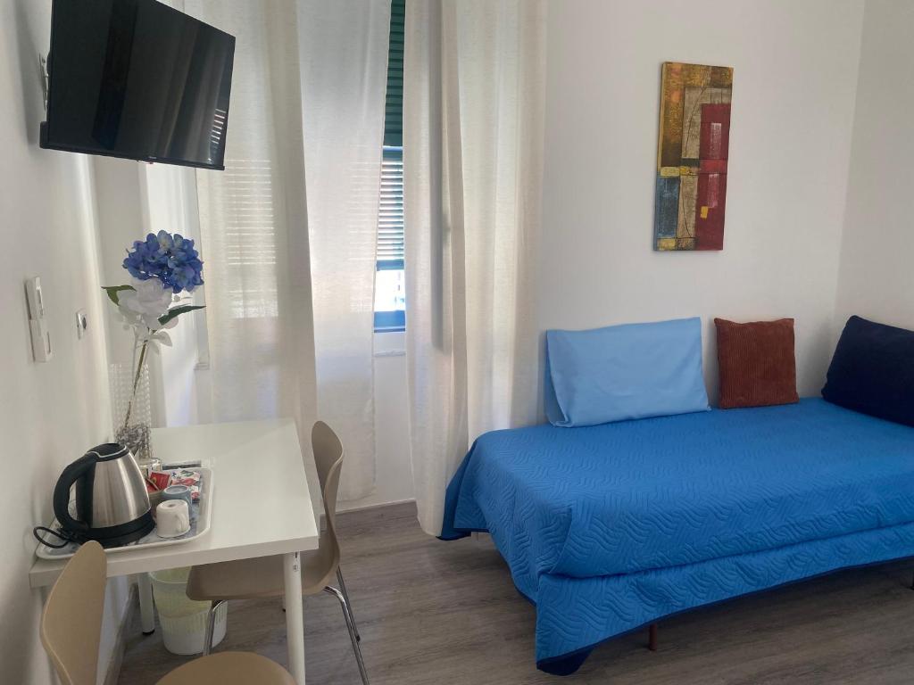 TV a/nebo společenská místnost v ubytování Titi Rooms