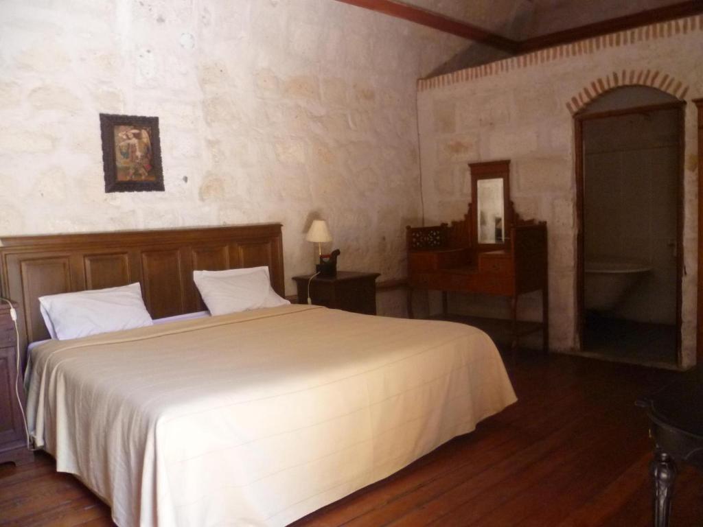 Postel nebo postele na pokoji v ubytování La Casa de Melgar