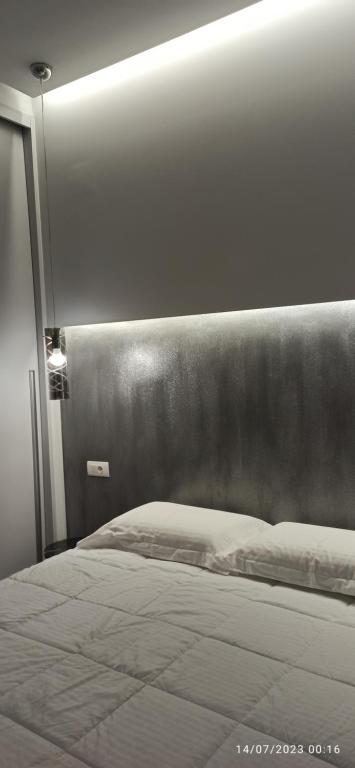 A bed or beds in a room at ERODIOS TOWN