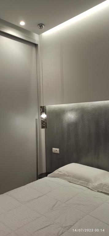 A bed or beds in a room at ERODIOS TOWN