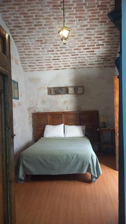 Postel nebo postele na pokoji v ubytování La Casa de Melgar