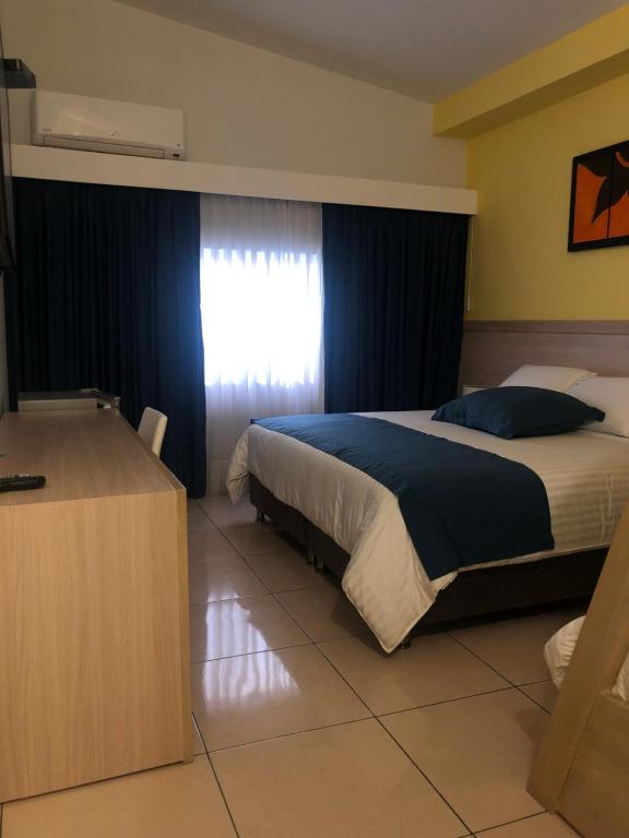 Voodi või voodid majutusasutuse Hostel paradise St toas