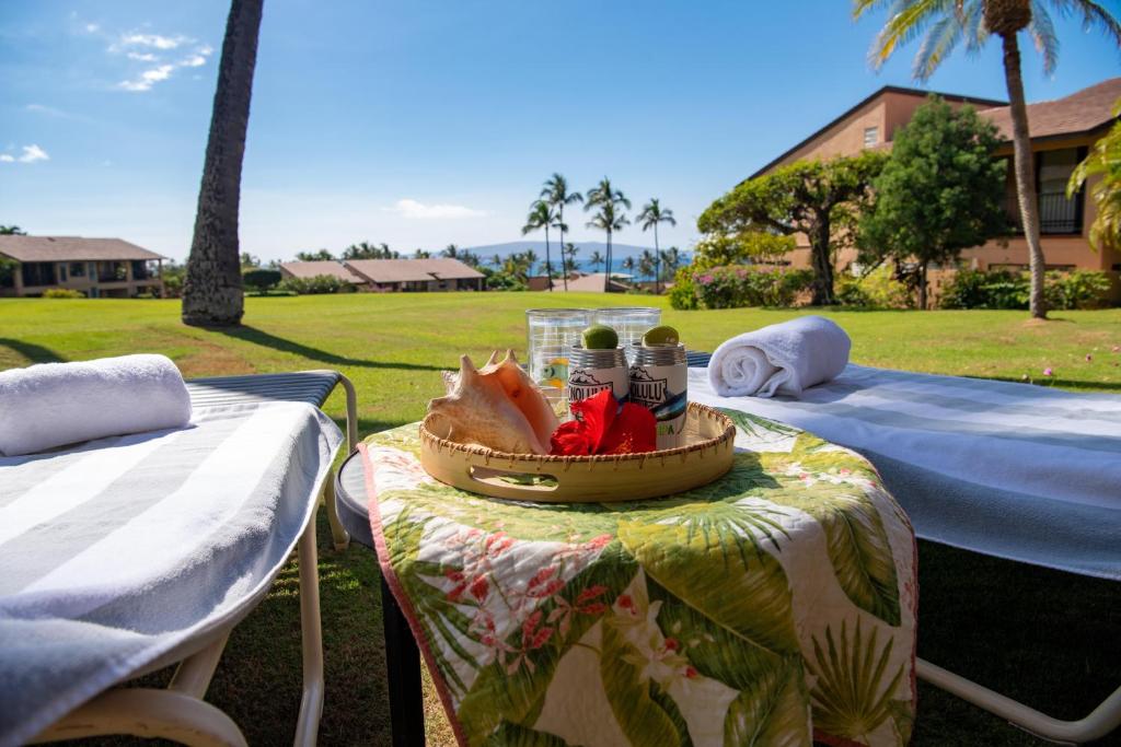 a table with a bowl of food on top of a table at Wailea Ekahi 32B in Wailea