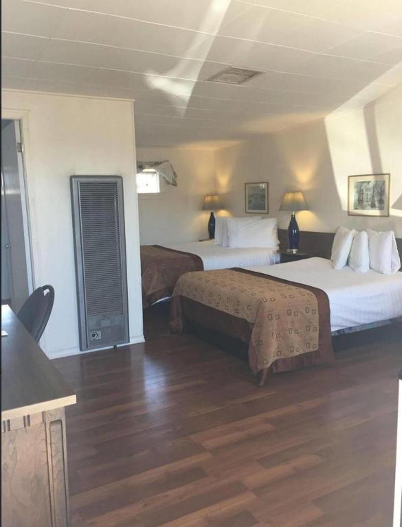 Voodi või voodid majutusasutuse Robbie's Motel toas