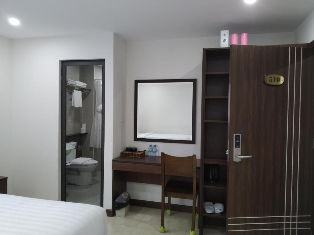 Postel nebo postele na pokoji v ubytování K Business 1 Hotel My Dinh 미딩
