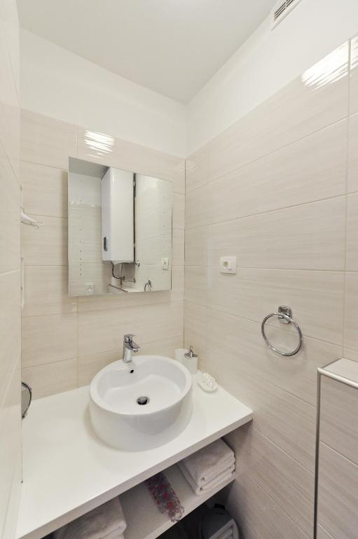 Kúpeľňa v ubytovaní Luka Residence Apartments