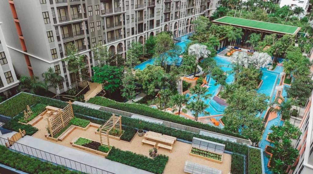 an aerial view of a water park in a apartment building at La Habana Hua Hin in Hua Hin