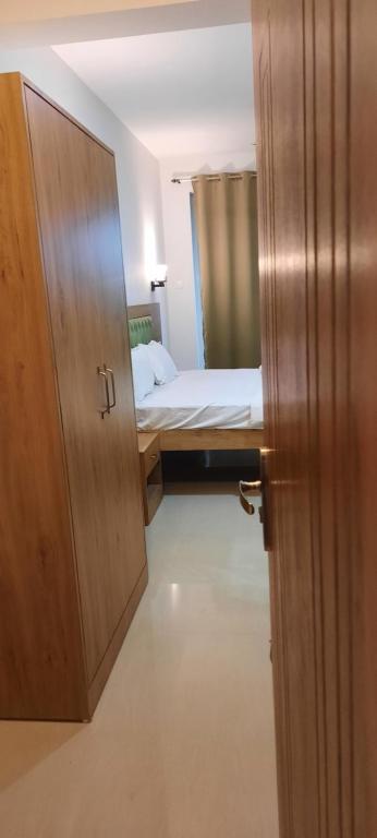 Postel nebo postele na pokoji v ubytování Eve Resort