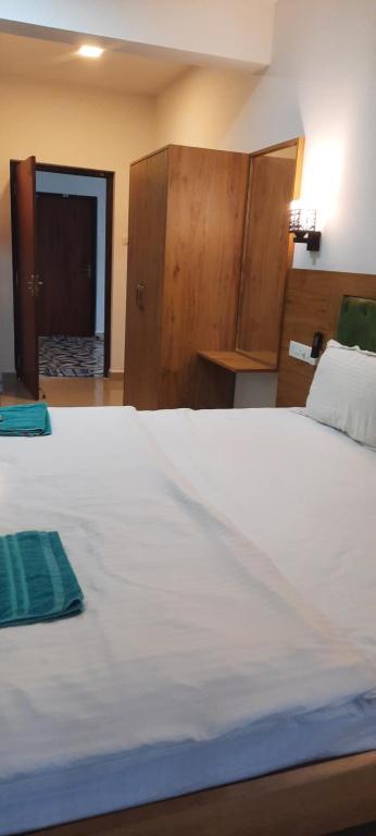Postel nebo postele na pokoji v ubytování Eve Resort